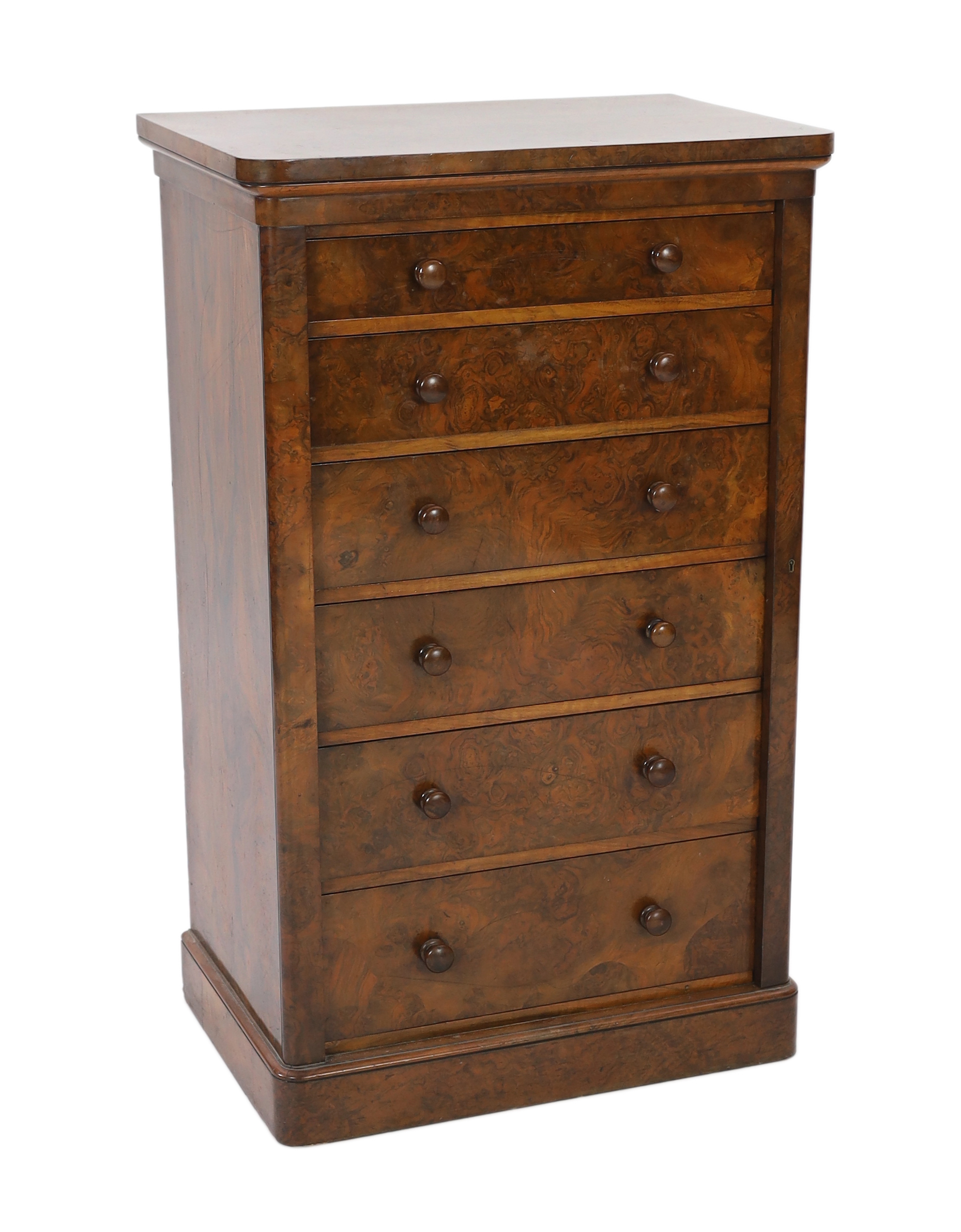 A Victorian walnut Wellington chest, retailed by Toplis & Son, Berners Street, London, width 62cm, depth 43cm, height 102cm
